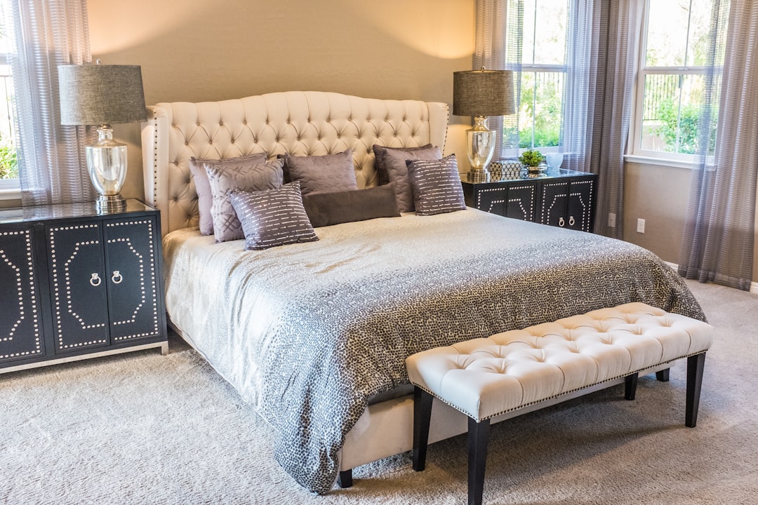 Photo by Quilia throw pillow on bed frame